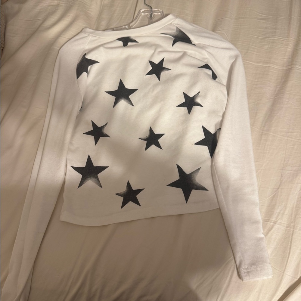 SHEIN White Long Sleeve Top with Black Star Print, cropped fit
